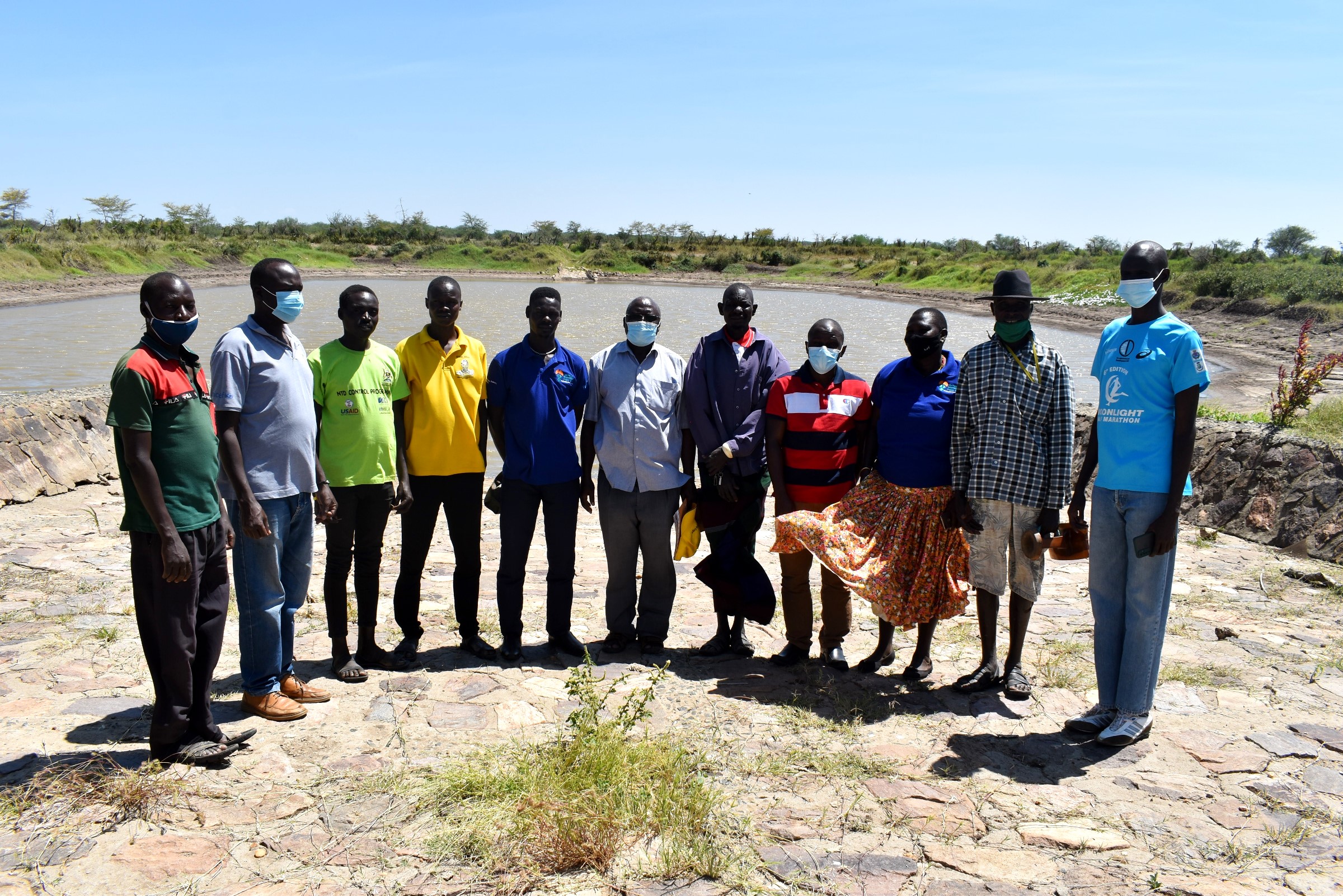 District Local Government officials, Village and Sub-County leaders and the Research team pose for a group photo after the site handover in Rupa Sub-County, Morot District on 24th October 2021.