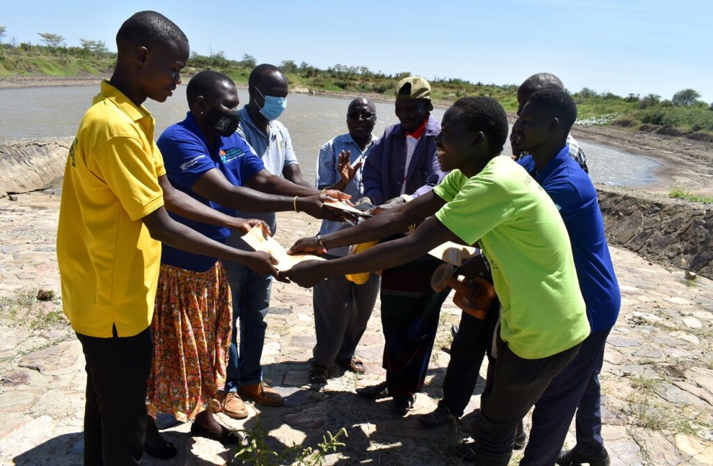 The Sub-County and Village officials symbolically hand over the site to the Moroto District team on 24th October 2021. 