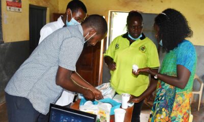 The Research Team from Right to Left: PI-Dr. Agnes Nabubuya, Dr. Immaculate Nakalembe, Undergrad student-Mr. Mwaka and Masters student-Mr. Paddy Ainebyona prepare some of the products for tasting by participants on 9th October 2021, Kigorobya sub-County, Hoima District.