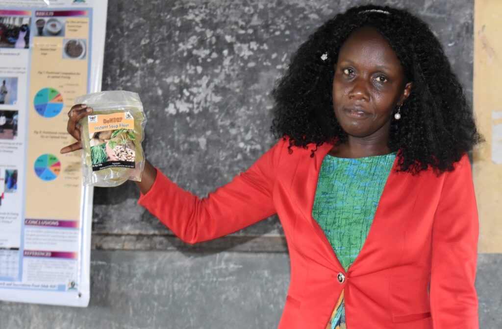 The PI-Dr. Agnes Nabubuya speaks about one of the products (Instant Soup Floor) during the workshop.