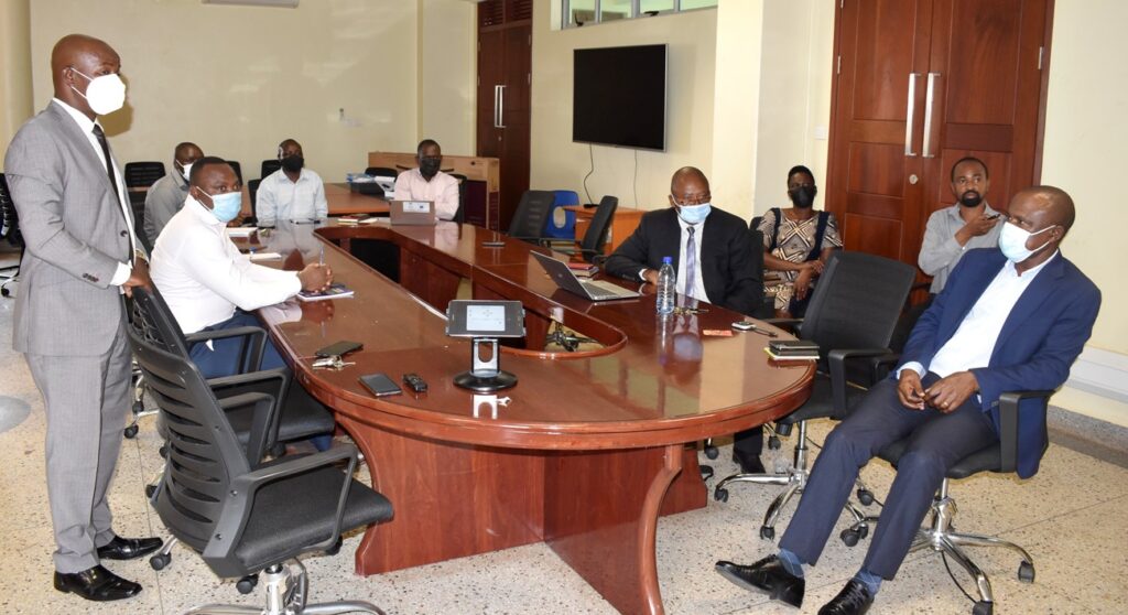 The PI, Prof. Edward Bbaale (L) speaks during the unveiling of procured equipment. 