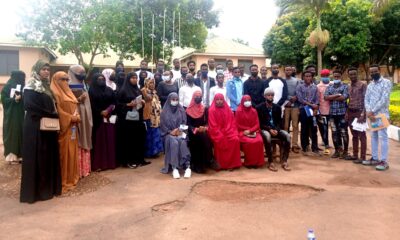 The Project PI-Dr. Anthony Tibaingana (Centre in white shirt) and part of the research team with some of the over 70 Somali refugees attending a three month-long training in entrepreneurship at Lubiri High School, Kampala after the first class on 25th October 2021.