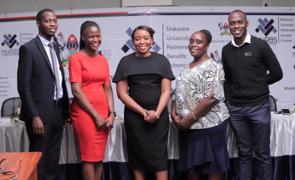 Members of the MURBS Secretariat led by Principal Pensions Office (PPO) Ms. Susan Khaitsa (C), and L-R: Assistant PPO (APPO) Mr. Patrick Sempijja, APPO Mrs. Juliet Nabukeera Kitaka, Office Administrators Ms. Rhona Asingwire and Mr. Marvin Kakuba.