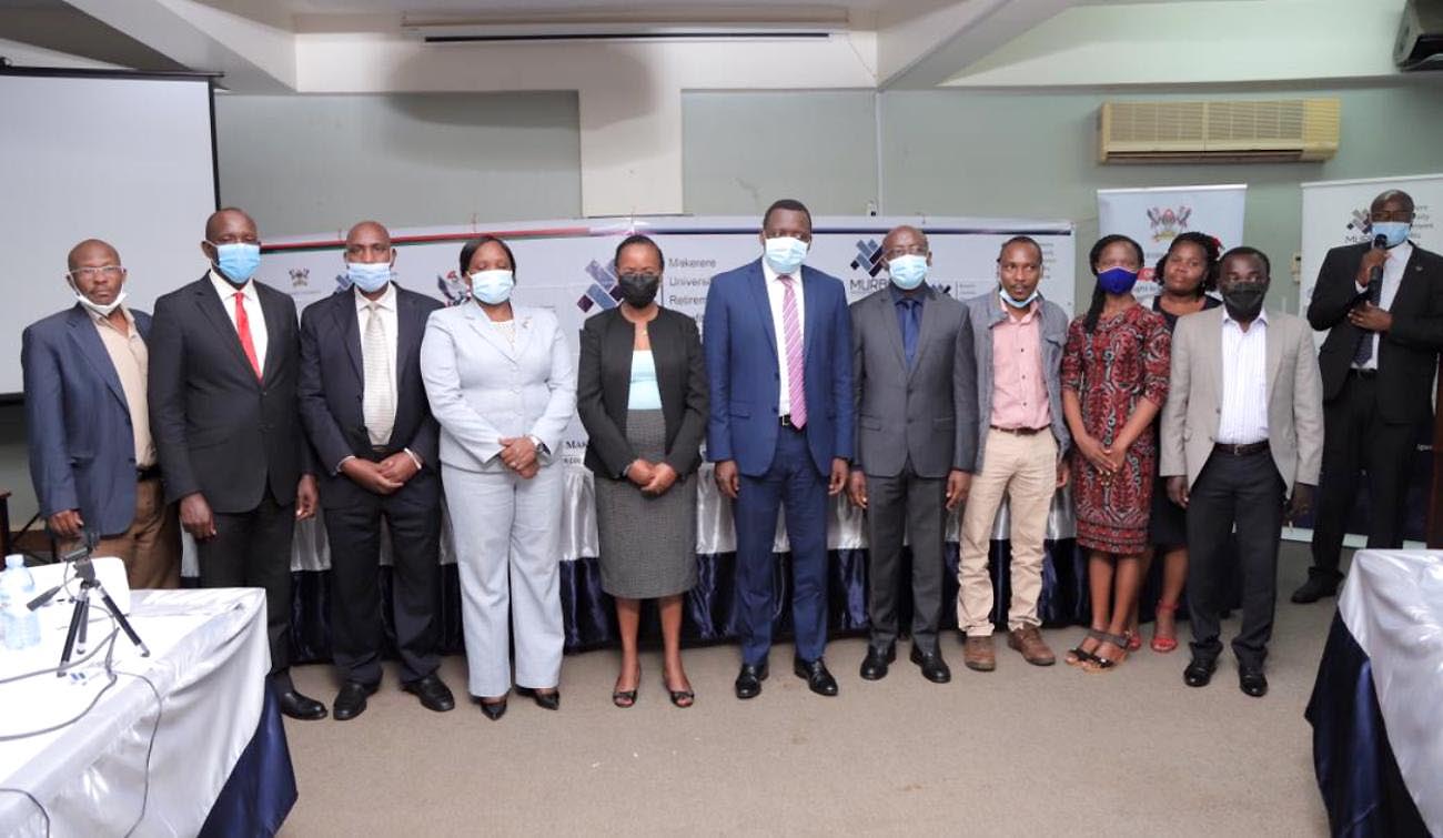 Assoc. Prof. Sarah Ssali (5th L) who represented the Chairperson Council with Members of Council, US-Mr. Yusuf Kiranda (6th L), URBRA's Mrs. Ritah Nansasi Wasswa (4th L), Chairperson MURBS BoT-Dr. Godwin Kakuba (7th L), MURBS Trustees, Representatives of Management as well as the Chairman MUASA and Representatives of Staff Associations at the presentation held on 19th October 2021, Senate Building, Makerere University.