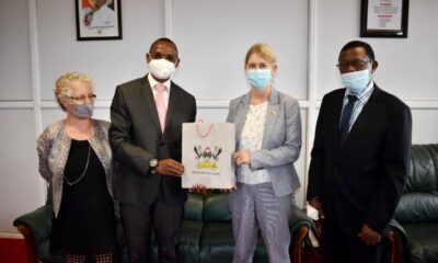 The Acting Vice Chancellor and Deputy Vice Chancellor (Academic Affairs)-Dr. Umar Kakumba (2nd L) presents an assortment of souvenirs to Ambassador Maria Håkansson (2nd R) as Prof. Buyinza Mukadasi (R) and Dr. Gity Behravan (L) witness on 30th September 2021, CTF1, Makerere University.