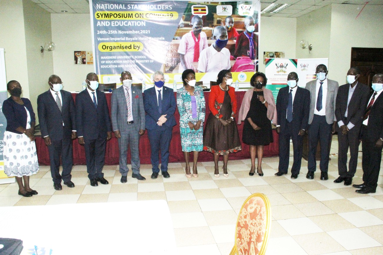 The Chairperson of Council, Mrs Lorna Magara (6th R) who represented the First Lady and Minister of Education and Sports, Hon. Janet Museveni, H.E. Kevin Colgan, Ireland's Ambassador-designate to Uganda and Rwanda (5th L), Vice Chancellor, Prof. Barnabas Nawangwe (4th L), Mr. Timothy Ssejjoba-MoES (3rd R) and other officials at the symposium on 24th November 2021.