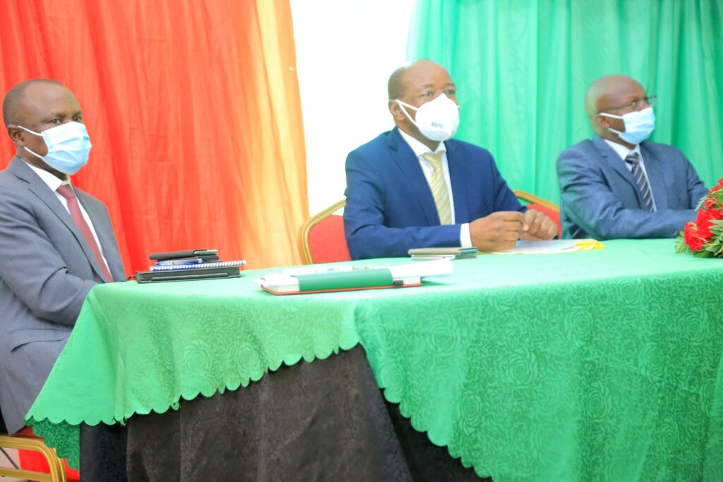 Minister of State for Planning, Hon. Amos Lugoloobi (C) with Principal CoBAMS-Prof. Eria Hisali (L) and Dean SSP-Dr. James Wokadala (R).