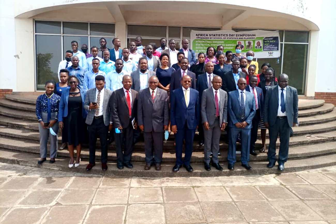 The Guest of Honour-Hon. Amos Lugoloobi (4th R), Prof. Ben Kireyera (C), Prof. Eria Hisali (3rd R), Dr. James Wokadala (2nd R) and Dr. Godfrey Akileng (R) with Speakers and Delegates at the Annual Statistics Day Symposium held on 18th November 2021, Food Science & Technology Conference Hall, Makerere University.