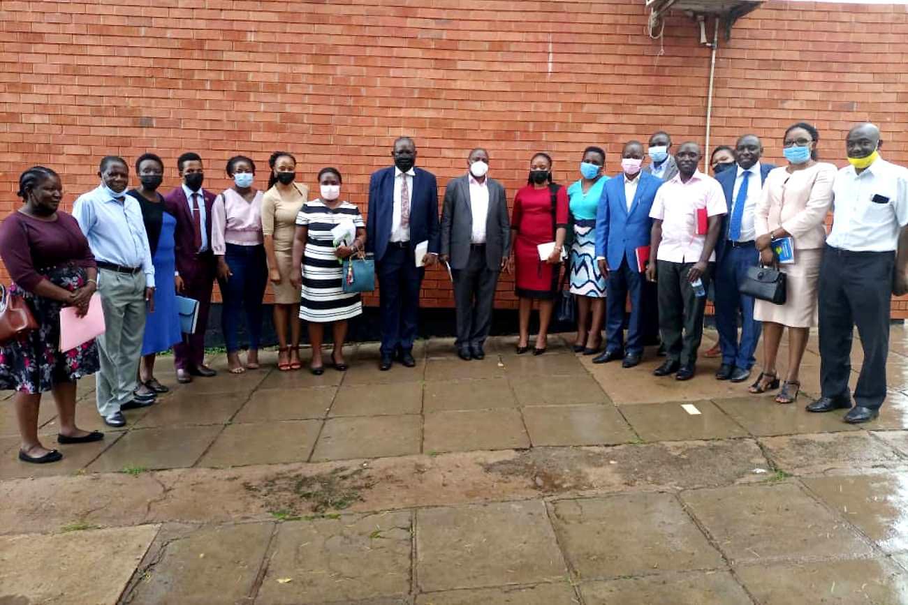 The Dean, Dr. Akileng Godfrey (8th L) with Staff and Facilitators after the capacity building session on 3rd November 2021, School of Business, CoBAMS, Makerere University.