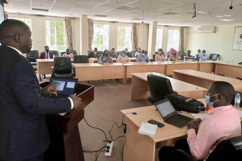 Participants listen keenly to Mr. Kakande's presentation.