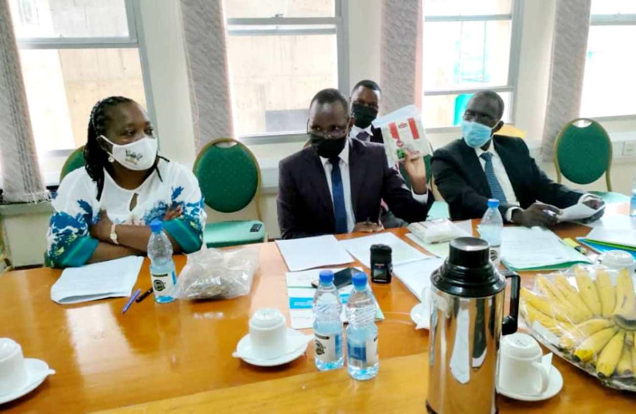 Dr. Jackson Efitre (C), Dr. Eric Sande (R) and Dr. Juliet Nattabi Kigongo (L) during the presentation at Parliament on 2nd November 2021.