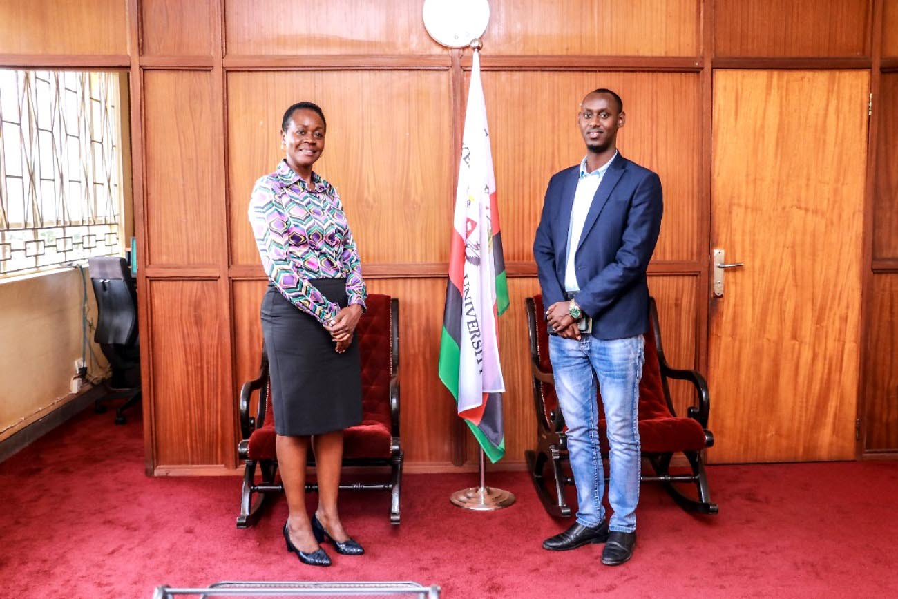 The Dean of Students, Mrs. Winifred Kabumbuli (L) with the Director of Social & Student Affairs Office at Somali National University (SNU), Mr. Ismail Abdullahi Ibrahim (R) during their meeting on 23rd November 2021 in the Dean's Office, Senate Building, Makerere University.