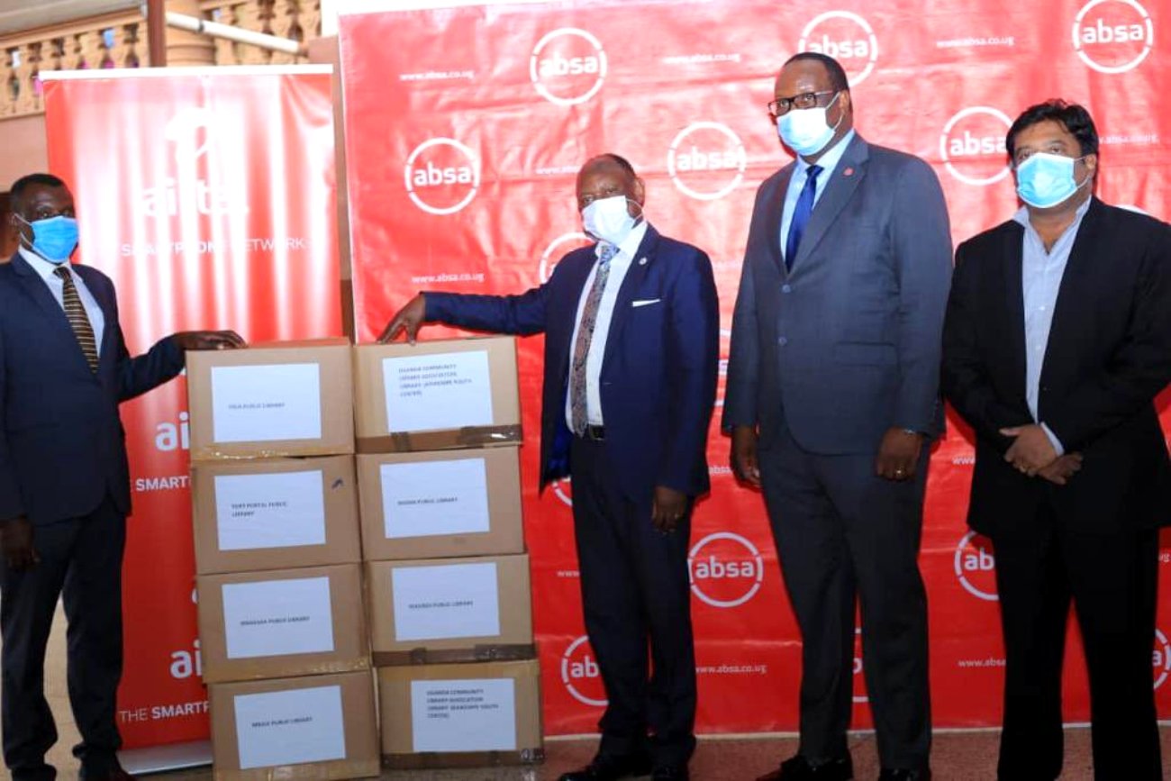 The Vice Chancellor, Prof. Barnabas Nawangwe (2nd L) with officials from Absa Uganda, Airtel Uganda and the National Libraries of Uganda during the handover of computers on 2nd November 2021.