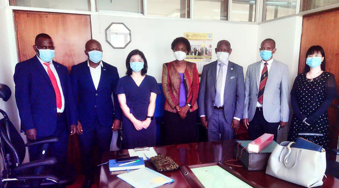 The Vice Chancellor, Prof. Barnabas Nawangwe (3rd R) with the Permanent Secretary, Ministry of Education and Sports, Ms. Ketty Lamaro (C), Directors from Mak’s Confucius Institute and MoES Officials after the meeting on 9th November 2021.