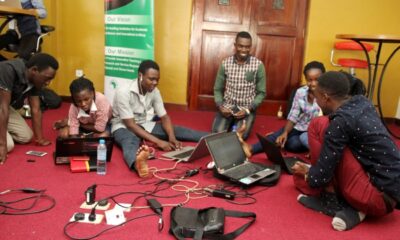 Terrydon Wamboga (L) with other innovators at a hackathon. Photo credit: RAN.