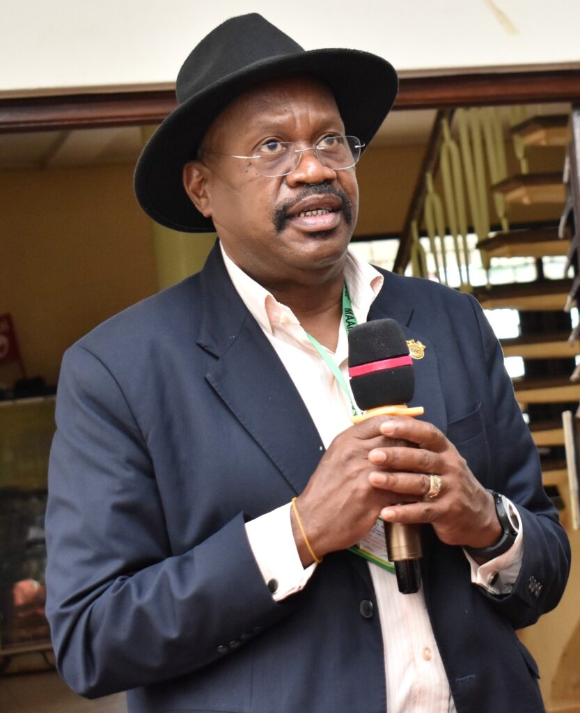 The Guest of Honour, Permanent Secretary Ministry of Agriculture, Animal Industry and Fisheries (MAAIF), Maj. Gen. David Kasura Kyomukama addresses participants at the Mak-RIF CAES Open Day on 14th December 2021, Makerere University.
