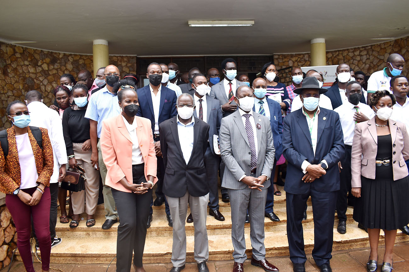 The Guest of Honour, PS MAAIF, Maj. Gen. David Kasura Kyomukama (2nd R) and the Vice Chancellor, Prof. Barnabas Nawangwe (3rd R) with the Principal CAES-Prof. Bernard Bashaasha (3rd L) and Deputy Principal CAES-Dr. Gorettie Nabanoga (R), researchers and other officials at the Mak-RIF CAES Open Day on 14th December 2021, Makerere University.