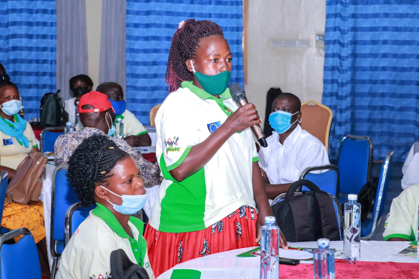 A VHT member submits during the Dissemination Workshop held on December 8th 2021 at Colline Hotel in Mukono District.