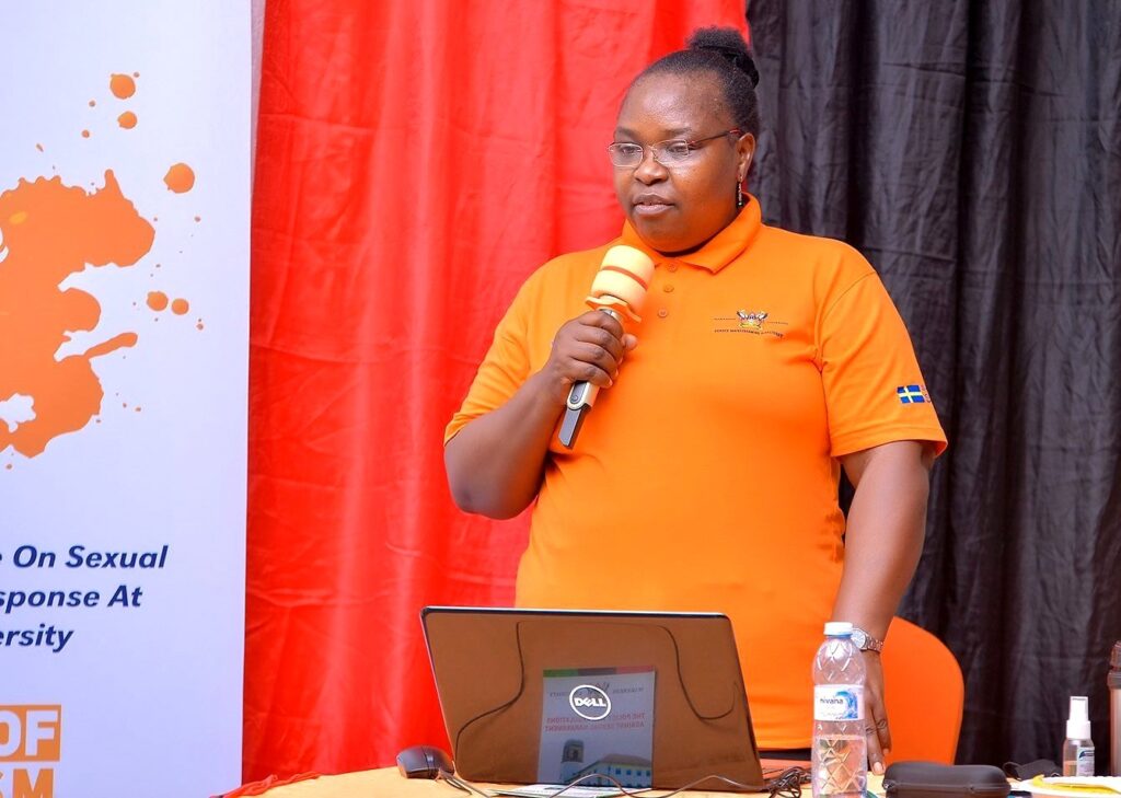 The Director, Gender Mainstreaming Directorate (GMD), Dr. Euzobia Baine Mugisha makes her presentation on the steps taken by Makerere University to address sexual harassment.