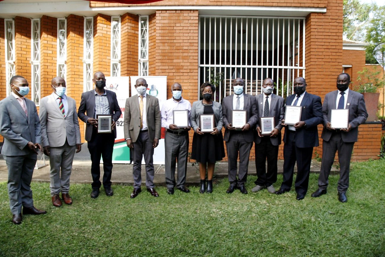 The Vice Chancellor, Prof. Barnabas Nawangwe (4th L) with L-R: DVCAA-Dr. Umar Kakumba, Ag. DVCFA-Prof. Henry Alinaitwe, Dr. Vincent Ssembatya, Prof. J.Y.T. Mugisha, Dr. Gorettie Nabanoga, Dr. Paul Birevu Muyinda, Dr. Fredrick Muyodi, Prof. Fred Masagazi Masaazi and Dr. Samuel Majalija at the End of Year Meeting on 22nd December 2021, VC’s Lodge, Makerere University.