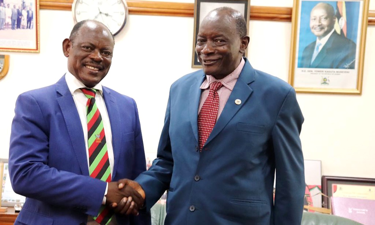 The Vice Chancellor-Prof. Barnabas Nawangwe (Left) and AAP's Prof. Issac J. Minde (Right) shake hands after their meeting on 4th November 2019, Makerere University, Kampala Uganda.