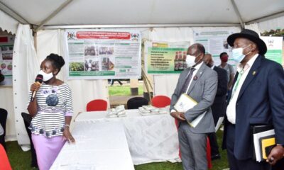 The PS MAAIF, Maj. Gen. David Kasura-Kyomukama (R) and Vice Chancellor, Prof. Barnabas Nawangwe (2nd R) listen to one of the exhibitors during the Mak-RIF CAES Open Day on 14th December 2021, Makerere University.
