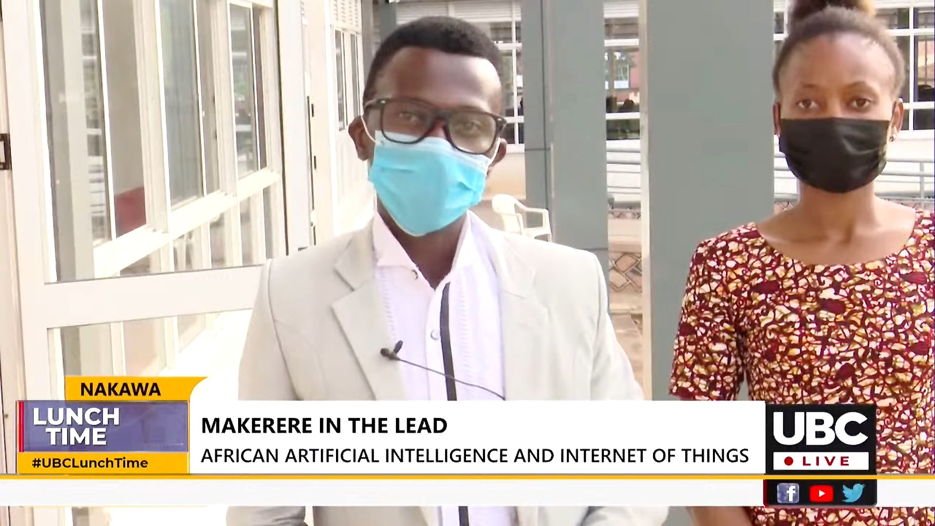 A screenshot of UBC TV's Lunchtime Bulletin of 20th November 2021 showing Mr. Mbusa Joseph (L) and a teammate at the UICT Premises in Nakawa.