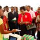 A student exhibiting MAKA Pads explains to Hon. Jessica Alupo (in red) standing next is Prof. Ddumba-Ssentamu, during the 2nd Annual CEDAT Open Day on 6th October 2012.