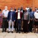 Dr. Susan Kavuma (5th L) and Mr. Emmanuel Keith Kisaame (7th L) with researchers and participants that took part in the dissemination on 19th January 2022 at CoBAMS, Makerere University.
