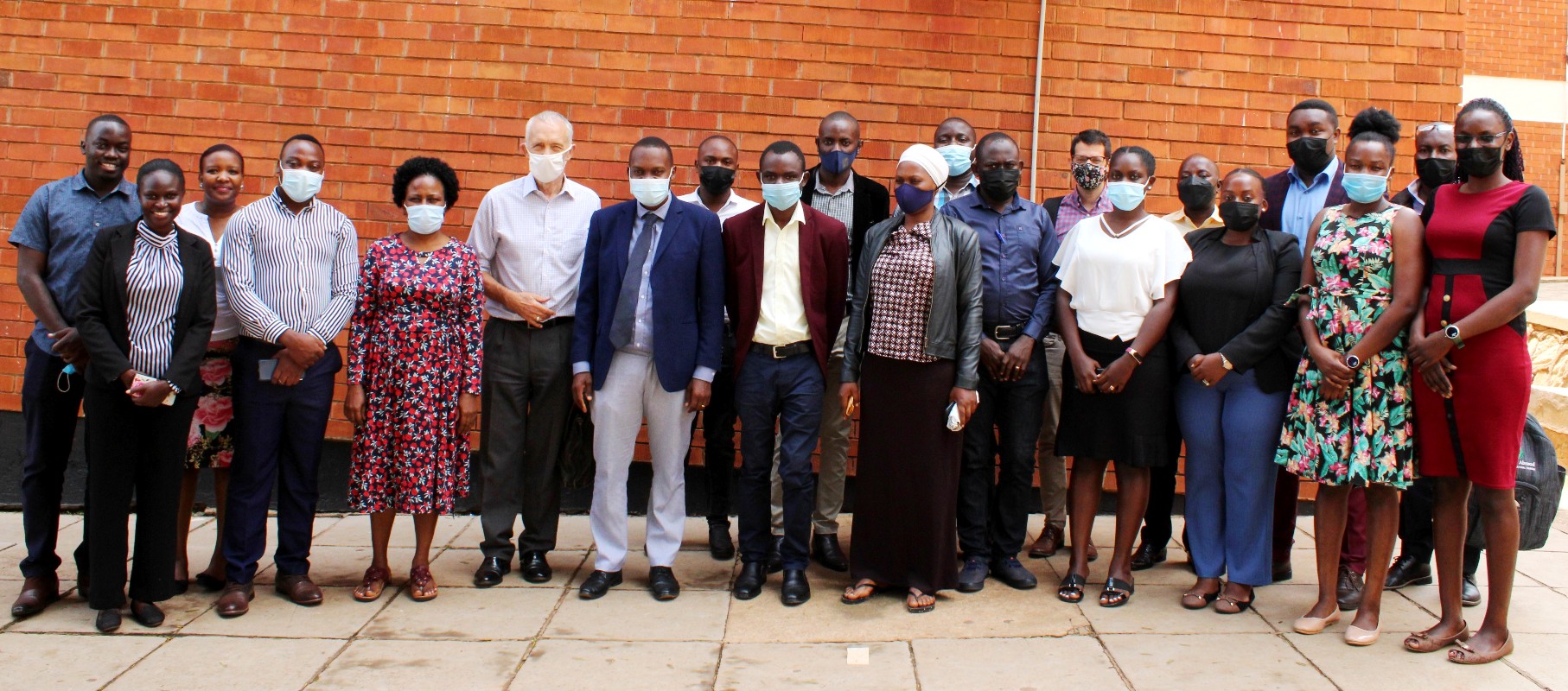 Dr. Susan Kavuma (5th L) and Mr. Emmanuel Keith Kisaame (7th L) with researchers and participants that took part in the dissemination on 19th January 2022 at CoBAMS, Makerere University.