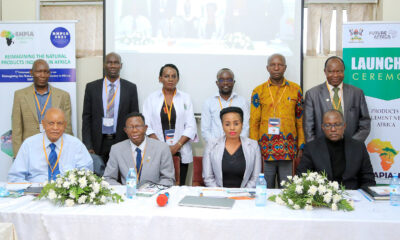 Seated L-R: Fmr. Chancellor-Prof. Mondo Kagonyera, Director DRGT-Prof. Buyinza Mukadasi, Convener-Dr Alice Nabatanzi and Representative of the DVCAA-Prof. Christopher Mbazira with Dep. Principal CoNAS-Prof. Fredrick Muyodi (Standing R) and representatives from partner institutions at the 1st NAPIANA Symposium on 17th January 2022, Makerere University.