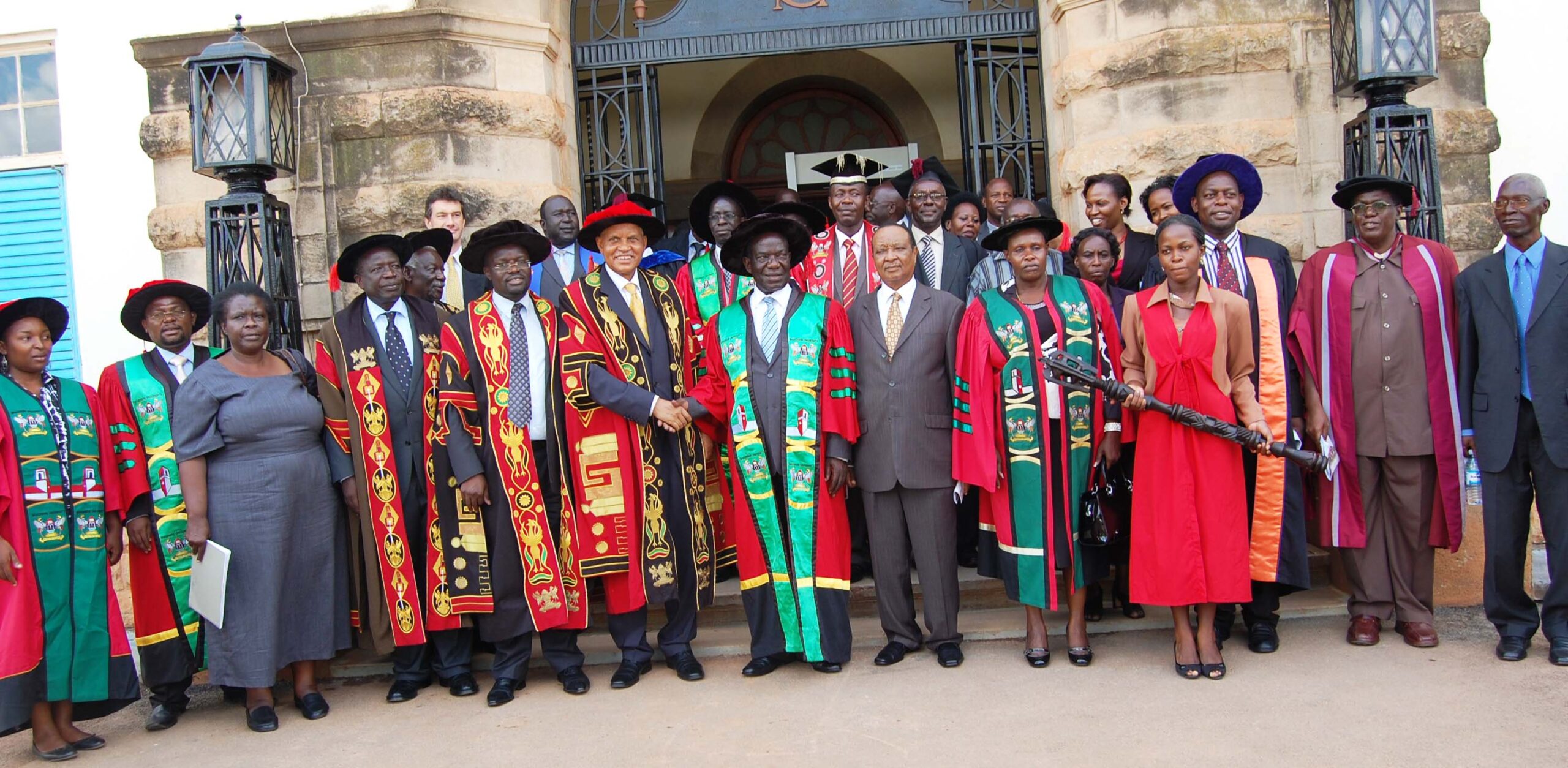 The Vice President, H.E. Edward Ssekandi and the Chancellor, Prof. Mondo Kagonyera shake hands after the installation ceremony on 12th January 2012 at Makerere University.