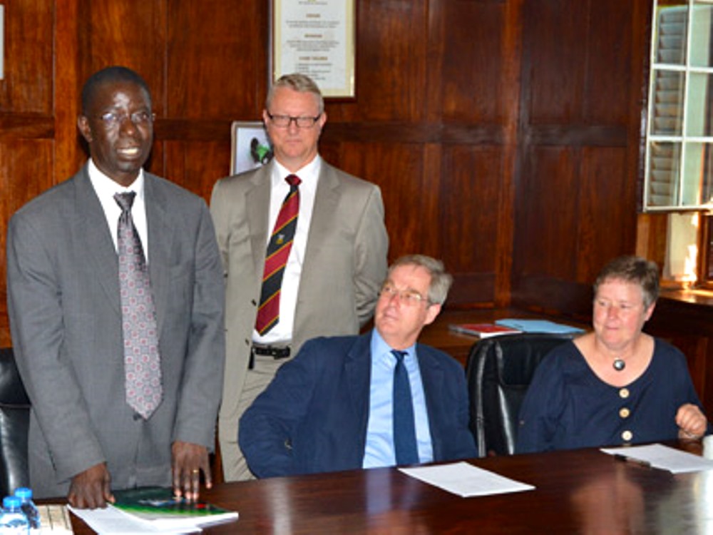 The Collaboration Coordinators of Makerere University and University of Bergen Prof. Edward Kirumira (L) and Prof. Thorkild Tylleskar (2nd L). Looking on is Jennifer Greenwood (R)  and her husband.