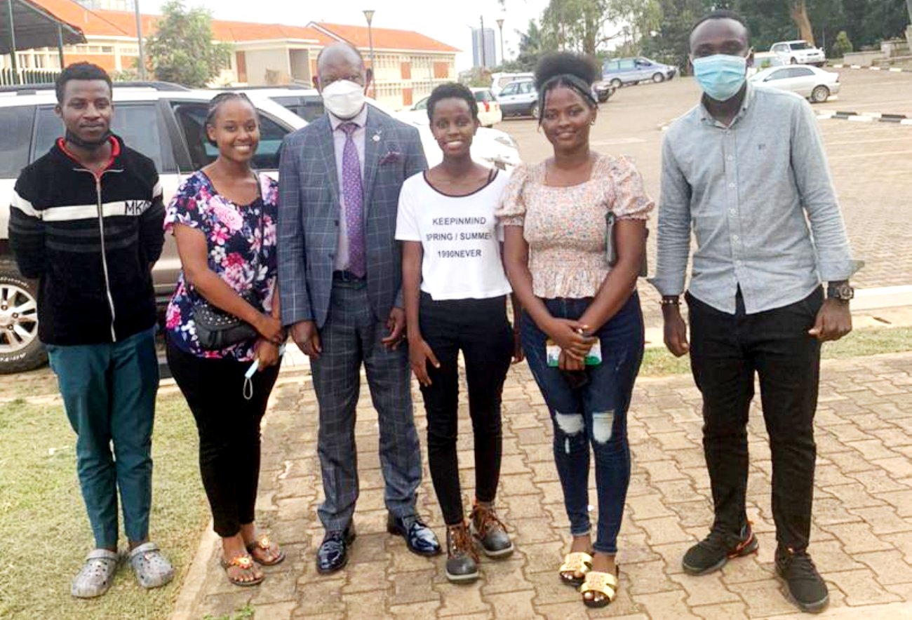 The Vice Chancellor, Prof. Barnabas Nawangwe (3rd L) with the gallant Makerereans that surprised him with a Birthday hamper at CTF1, Makerere University.