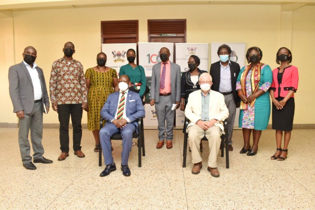 Seated: Prof. Barnabas Nawangwe (L) and Prof. Hugh Rowell (R) with Standing L-R: Mr. Mujuni Tayari Deus, Assoc. Prof. Julius Kikooma, Dr. Euzobia Mugisha Baine, Mrs. Winifred Kabumbuli, Prof. Henry Alinaitwe, Assoc. Prof. Sylvia Nannyonga Tamusuza, Assoc. Prof. Patrick Mangeni, Assoc. Prof. Josephine Ahikire and Ms. Ritah Namisango after the Harpsichord handover ceremony. 