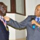 The Chancellor,Prof. Mondo Kagonyera (R) decorates H.E. John Agyekum Kufuor (L) with a medallion in appreciation of his public lecture on 2nd August 2013, Makerere University, Kampala Uganda.