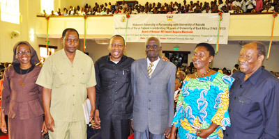 The Nyerere family poses for a group photo with Rwot Ananiya Akera.