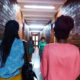 Female Students in the corridors of Africa, one of the Halls of Residence for Ladies at Makerere University.