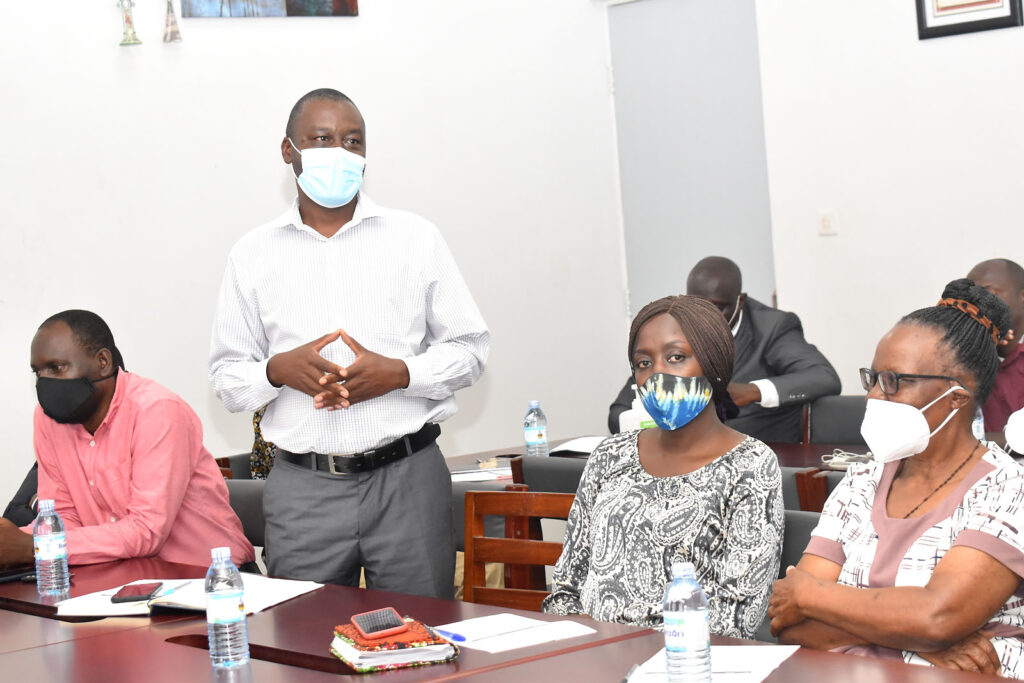 The Dean, School of Food Technology, Nutrition and Bio-Engineering, Dr. Abel Atukwase (Standing) passing a vote of thanks on behalf of CAES staff and welcoming the new Principal.