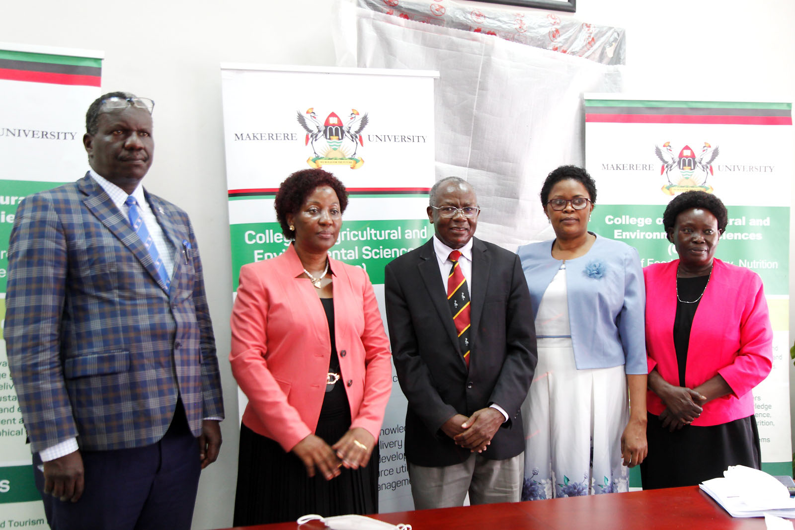 The Outgoing Principal, Prof. Bernard Bashaasha (C) and the new Principal, Dr. Gorettie N. Nabanoga (2nd L) together with the Director Internal Audit, Mr Yorac Nono (L), US Representative, Ms. Consolata Komugisha (2nd R) and CAES HR, Ms. Hawa Harriet (R) at the handover on 15th February 2022, Makerere University.