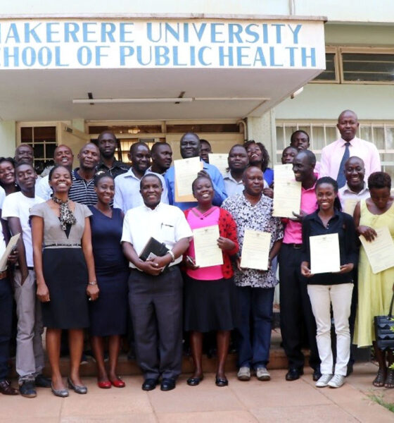 The Head, Department of Epidemiology and Biostatistics-Prof. Nazarius Mbona Tumwesigye (6th L) and the Head, Department of Disease Control and Environmental Health-Dr. Esther Buregyeya (4th L) pose with 25 graduands of the WASH Short Course on 20th July 2018, MakSPH, Mulago Campus, Makerere University.