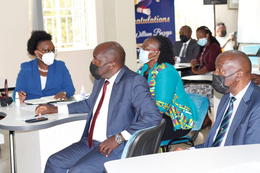 R-L: Prof. Henry Alinaitwe, Prof. Grace Bantebya, Prof. Fred Masagazi Masaazi and Prof. Rhoda Wanyenze listen to proceedings at the induction session.