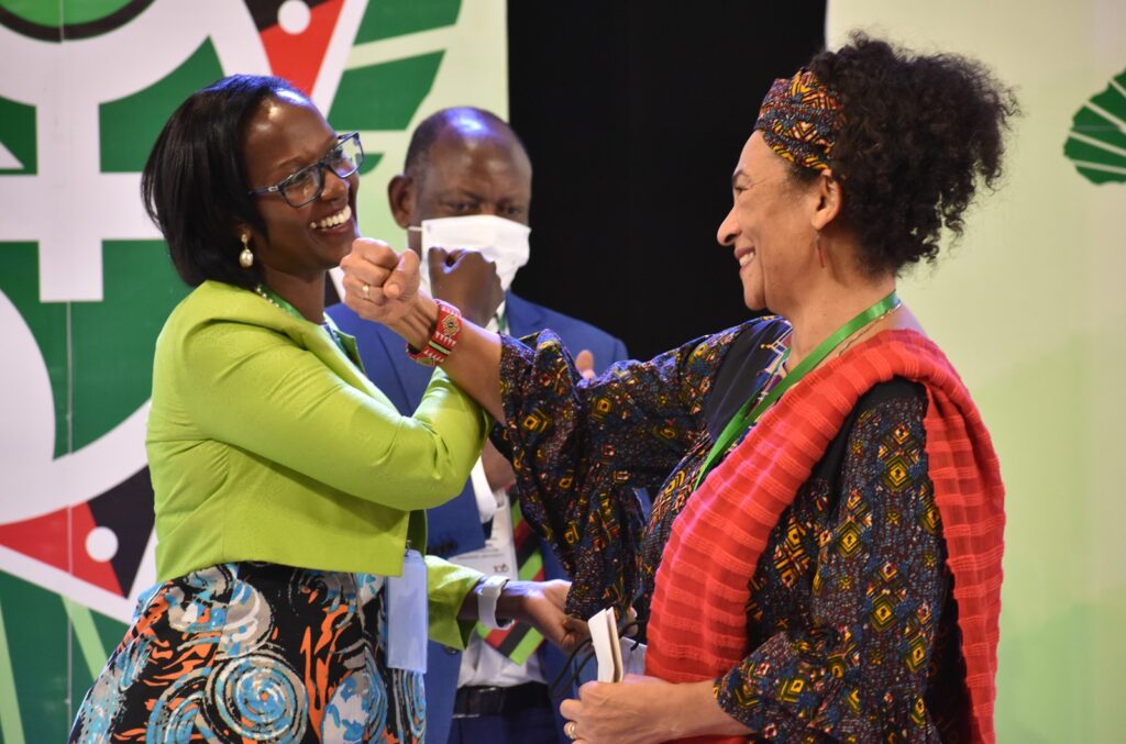 Mrs. Lorna Magara (L), Prof. Barnabas Nawangwe (C) and Prof. Amina Mama (R) enjoy a light moment at the Opening Ceremony.