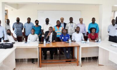Participants that attended the hybrid symposium on Transport and Covid-19 organised by CAES in collaboration with CEDAT pose for a group photo in the College of Computing and Information Sciences (CoCIS) Conference Room, Makerere University on 22nd February 2022.