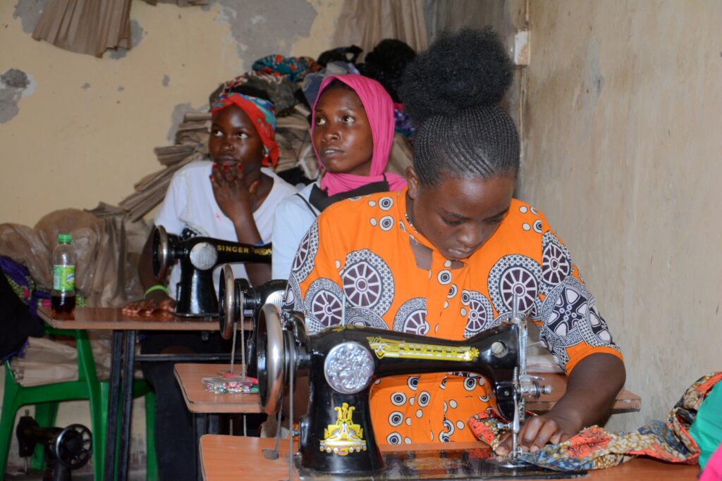 Some of the beneficiaries of the TOPOWA Project attend a tailoring course.