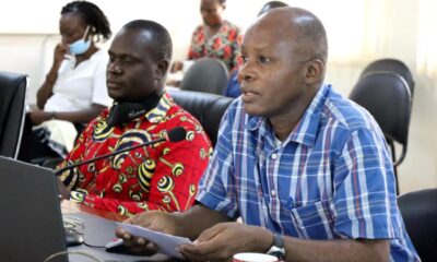 Dr. Levis Mugumya (R) speaking during the workshop held on 19th March 2022 in the CHUSS Smart Room, Makerere University and Online.