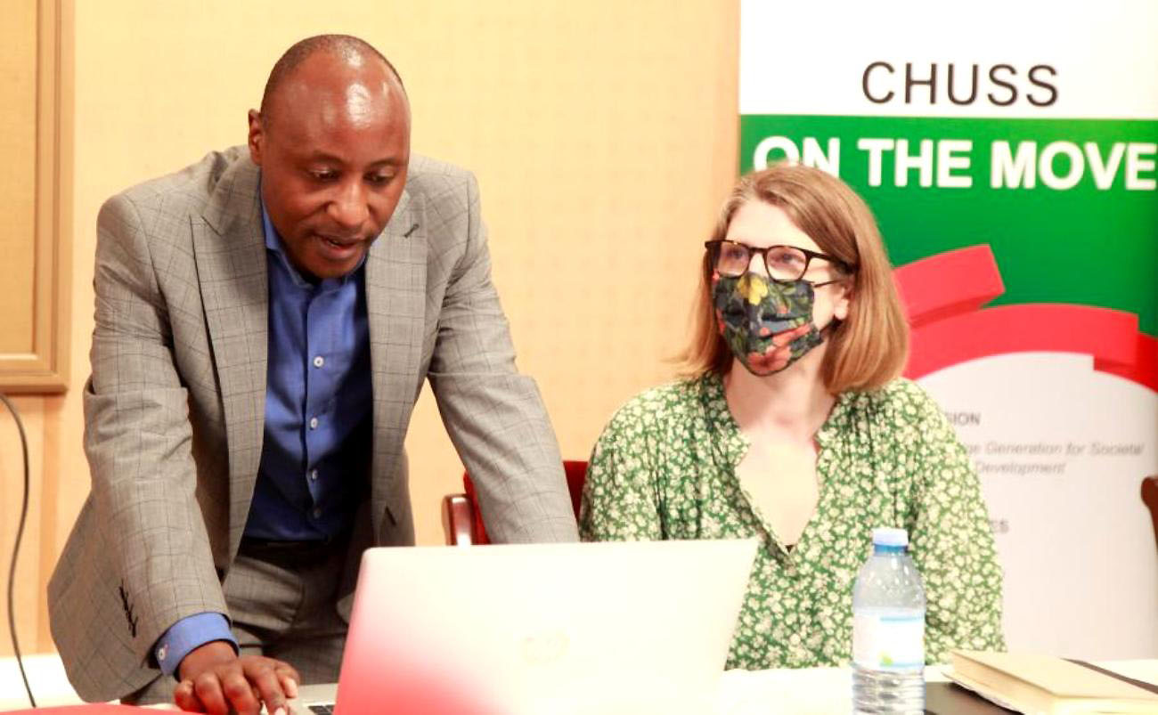 The in-country Principal Investigator Makerere University, Prof. Eddy Walakira (L) and Dr. Claire Tanton from the London School of Hygiene and Tropical Medicine (R) during presentation of the findings on 2nd March 2022, CTF1, Makerere University.