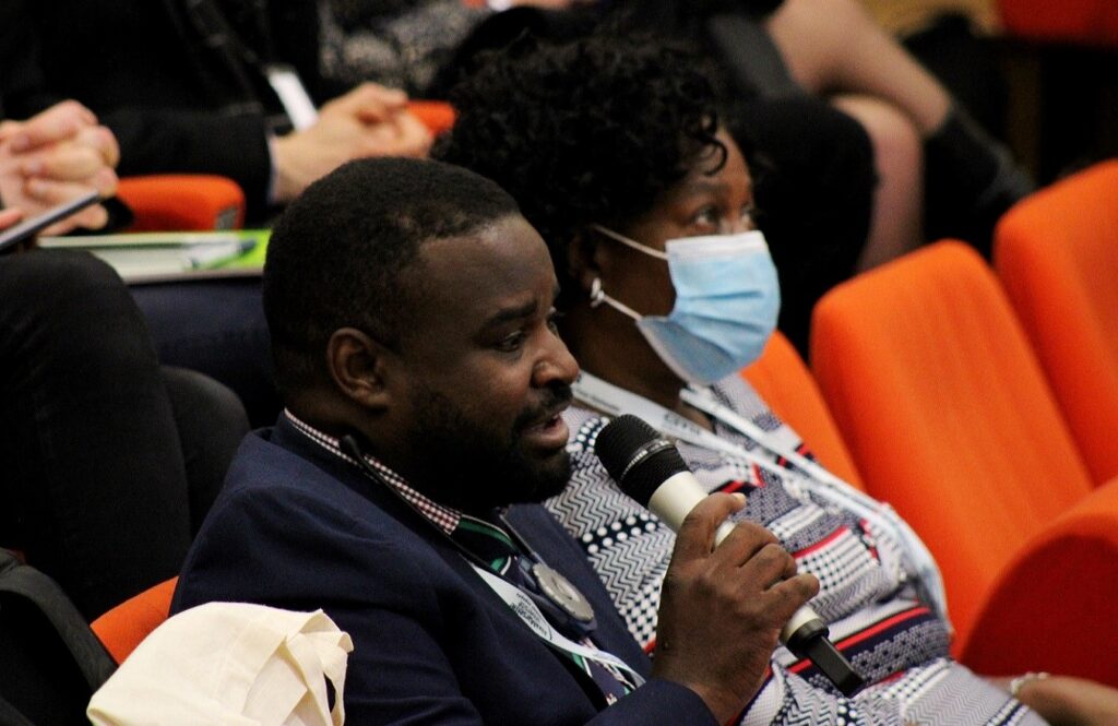 The Deputy Director, Directorate of Research and Graduate Training, Associate Professor Robert Wamala making a submission during the Conference at Aix-Marseille University.