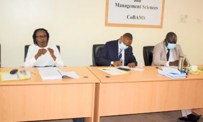 The DVCAA-Assoc. Prof. Umar Kakumba (C) with Assoc. Prof. Godfrey Akileng (R) and another official at Dr. Kasimu Sendawula's PhD Defence on 17th March 2022 at the School of Business, CoBAMS, Makerere University.