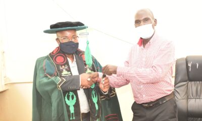 The outgoing Dean, Dr. Joseph Kyambadde (R) congratulating and handing over the keys to the Office of the Dean, School of Biosciences, College of Natural Sciences (CoNAS), Makerere University to Dr. Arthur K. Tugume (L) on 7th March 2022.